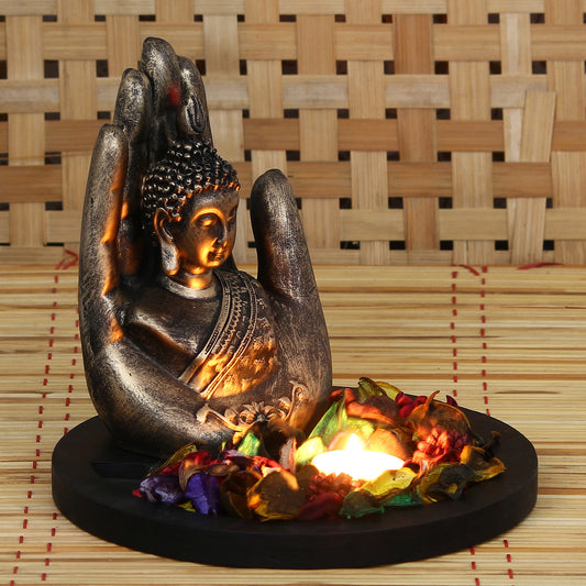 HomeSutra Copper Finish Handcrafted Palm Buddha Decorative Showpiece with Wooden Base, Fragranced Petals and Tealight