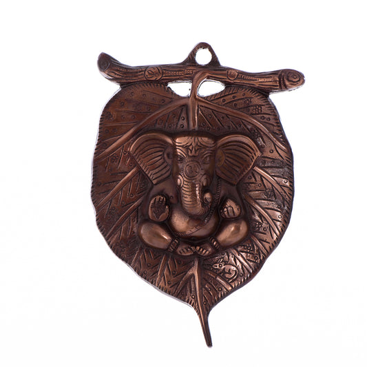 HomeSutra Metal wall hanging of Lord Ganesha on Leaf